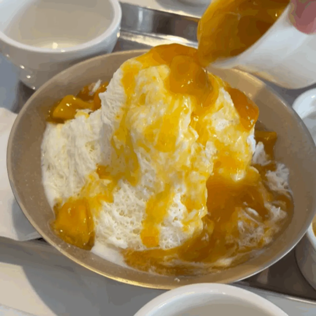Milk ice bingsu before the mango is added