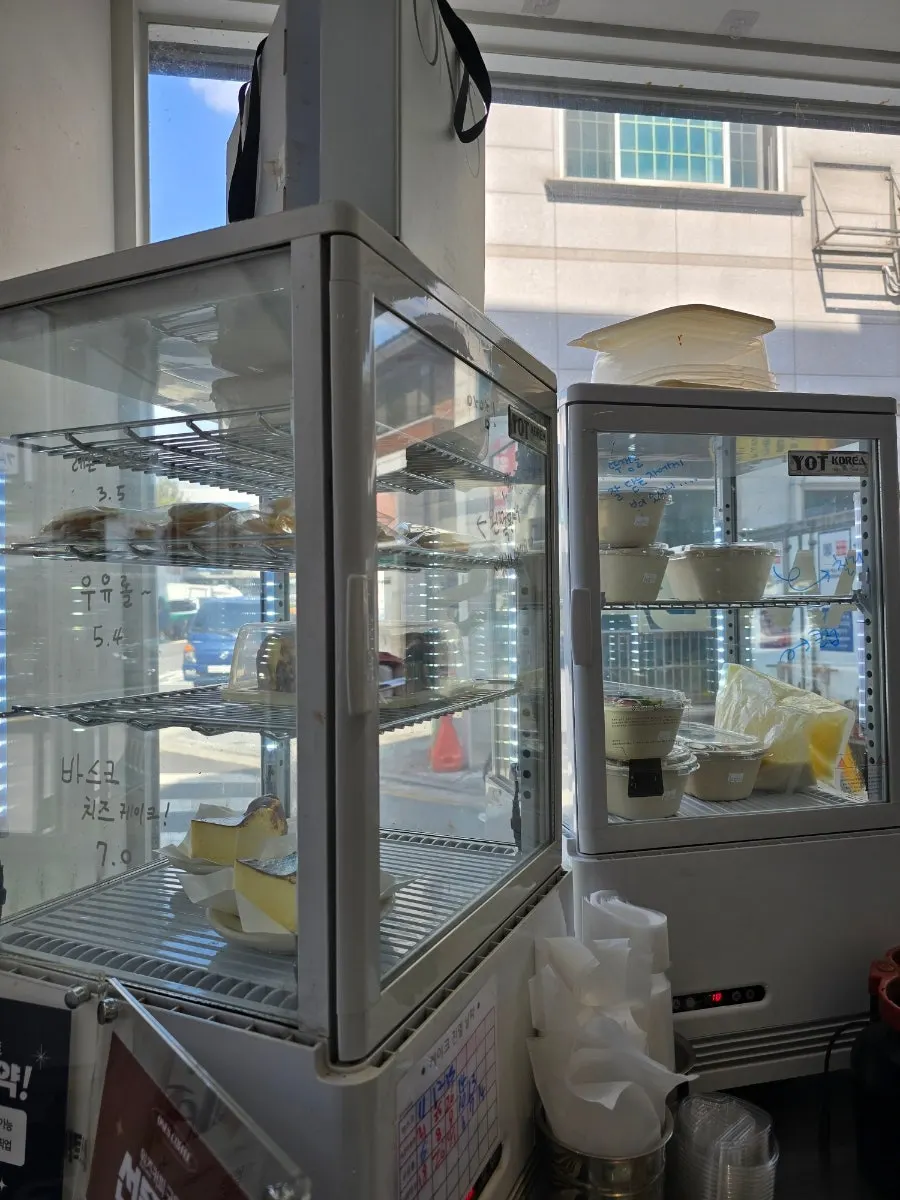 Desserts and cookies arranged in the display case