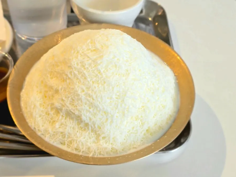 A generous mound of snowflake ice milk bingsu