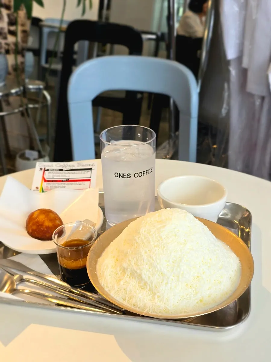Coffee and dessert at a window seat in Wonz Coffee