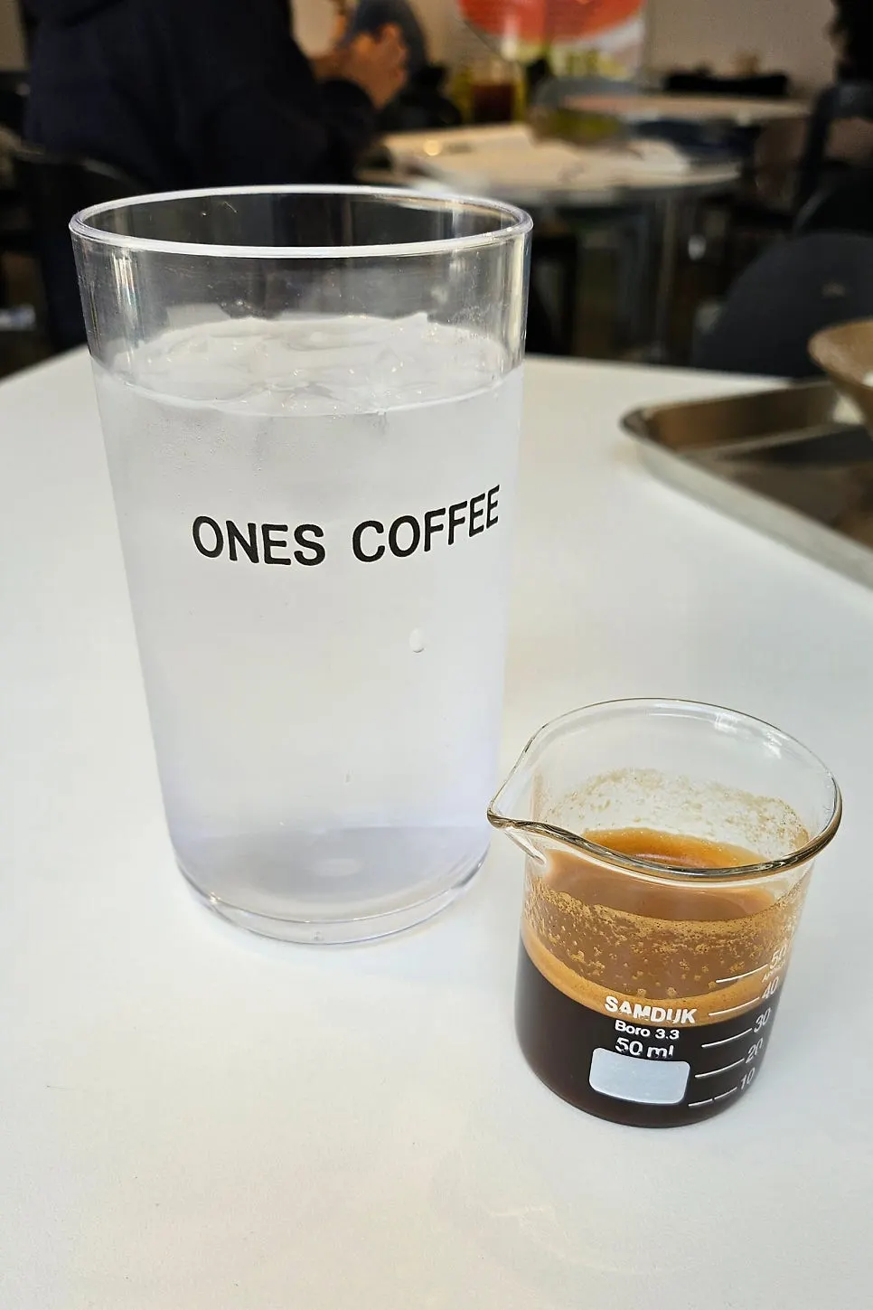 Espresso shot glass with crema on top