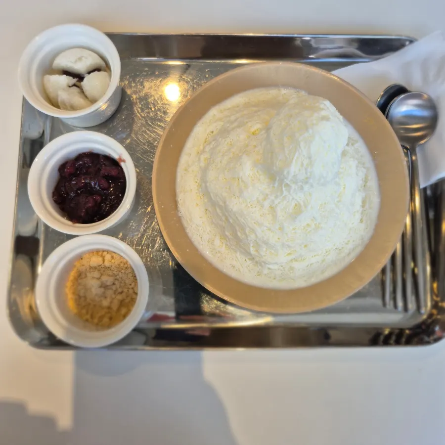 Snowflake red bean bingsu on the table