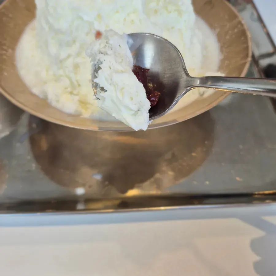 Two bowls of milk bingsu and snowflake red bean bingsu