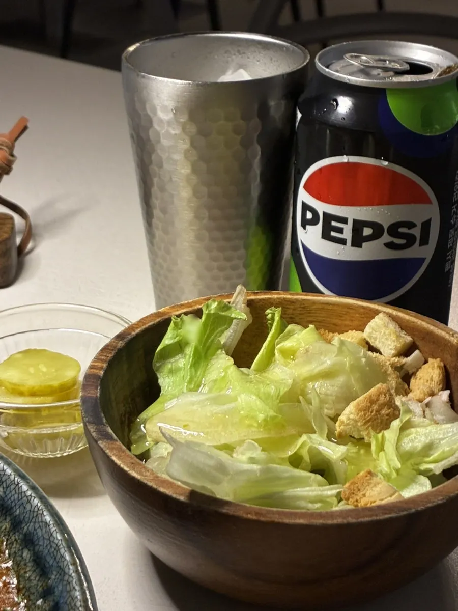Basic salad served in a wood bowl