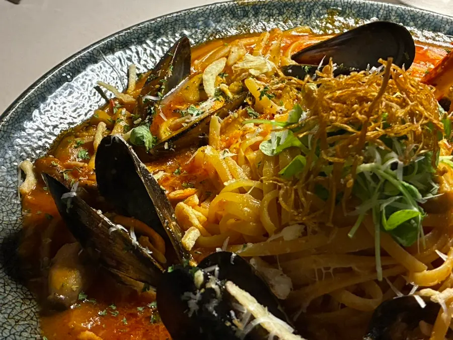 Seafood arrabbiata mixed together with the sauce