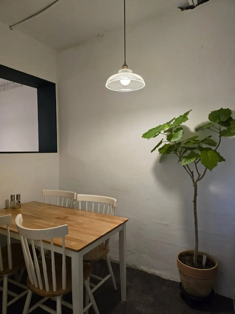Bright café space with a piano