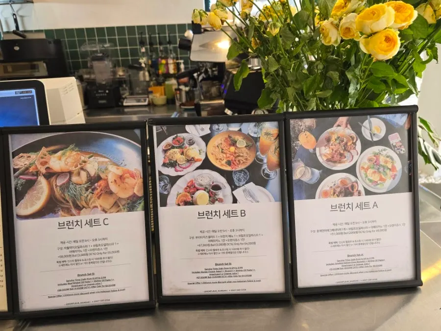 Sign listing menu items and prices