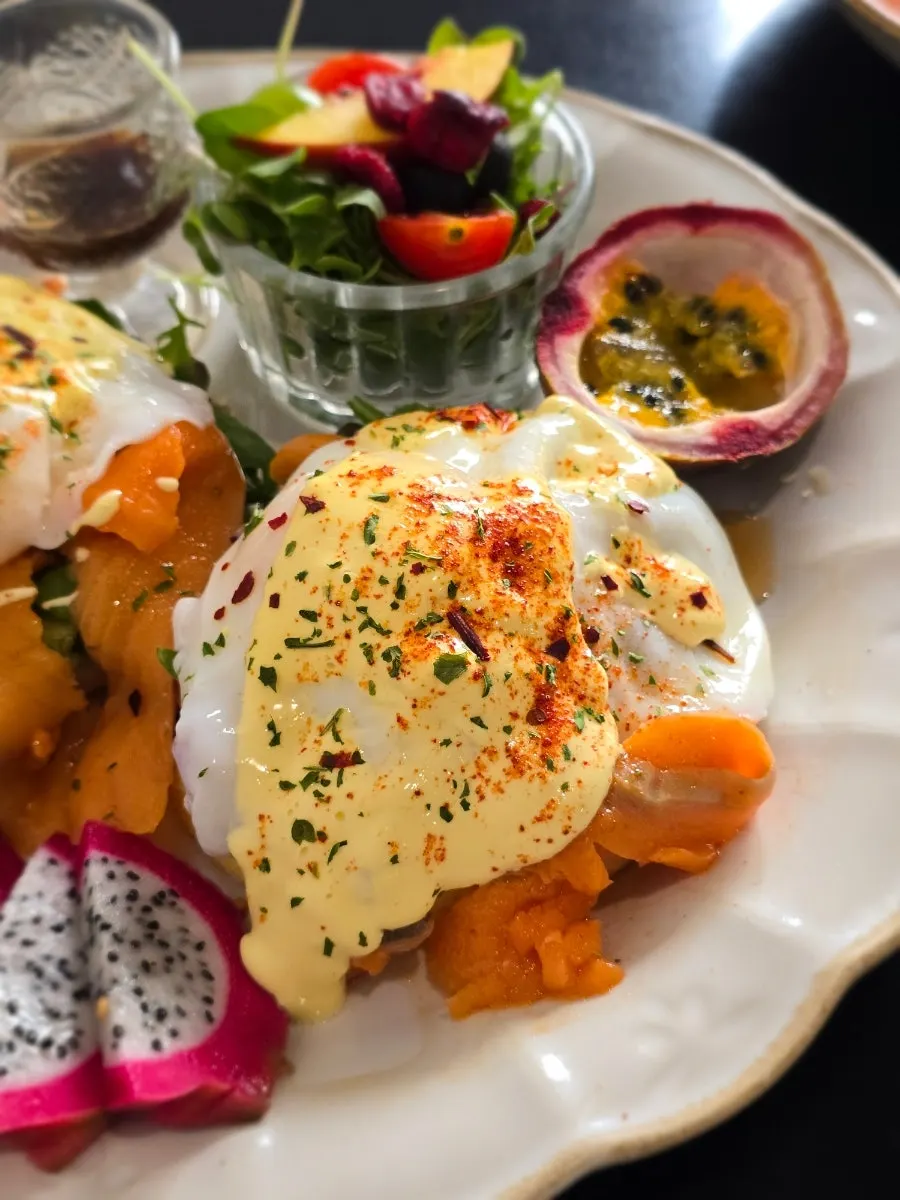 Brunch topped with soft-boiled egg and smoked salmon