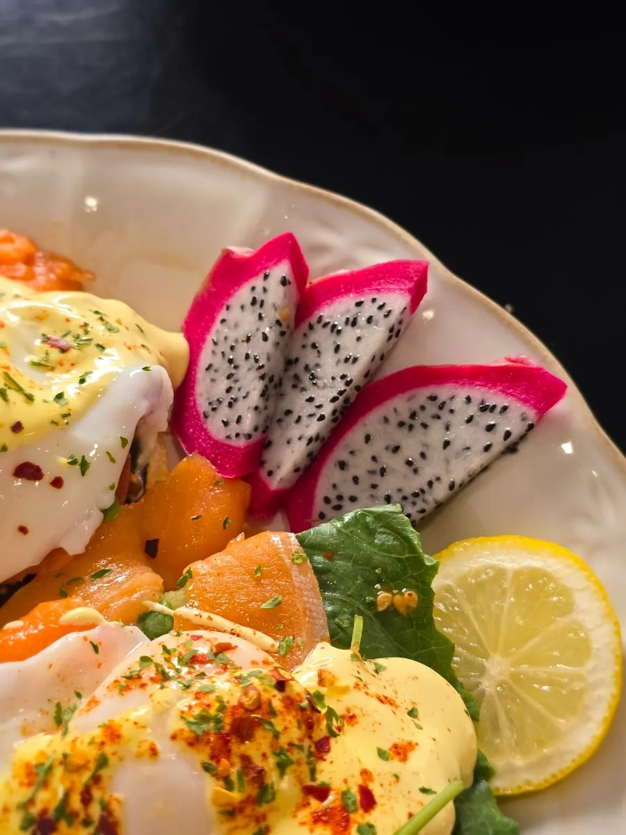 Eggs Benedict on top of chewy bread