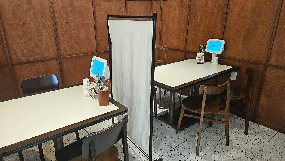 Section of the restaurant with baby chairs set up