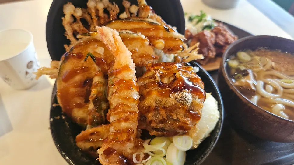Table setting with tendon, mini udon and chicken nanban