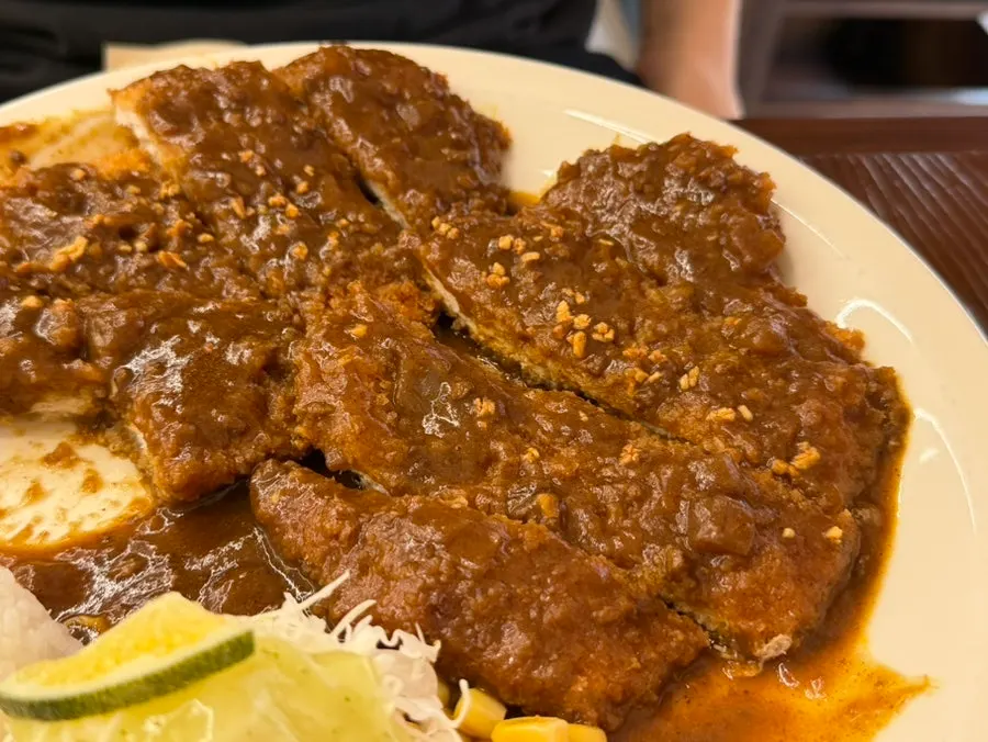 A slice of the cheddar cheese cutlet