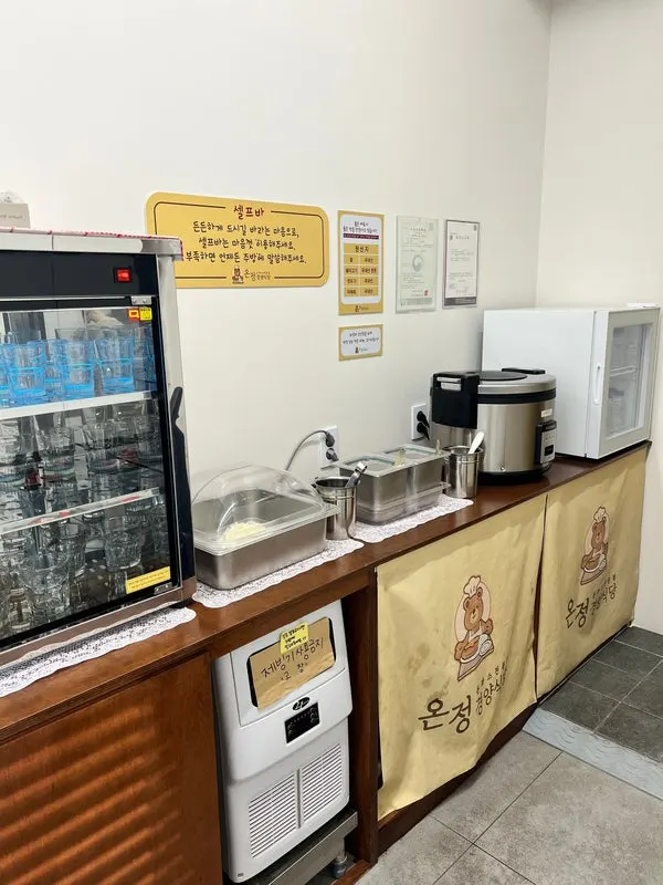 Neatly organized side dish section at the self-serve bar