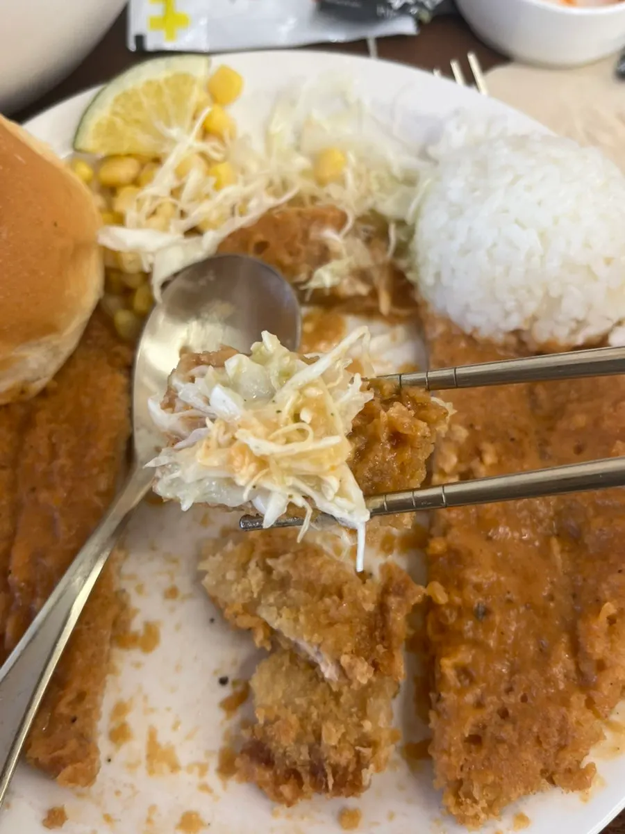 Cross-section of pork cutlet with sauce soaked in