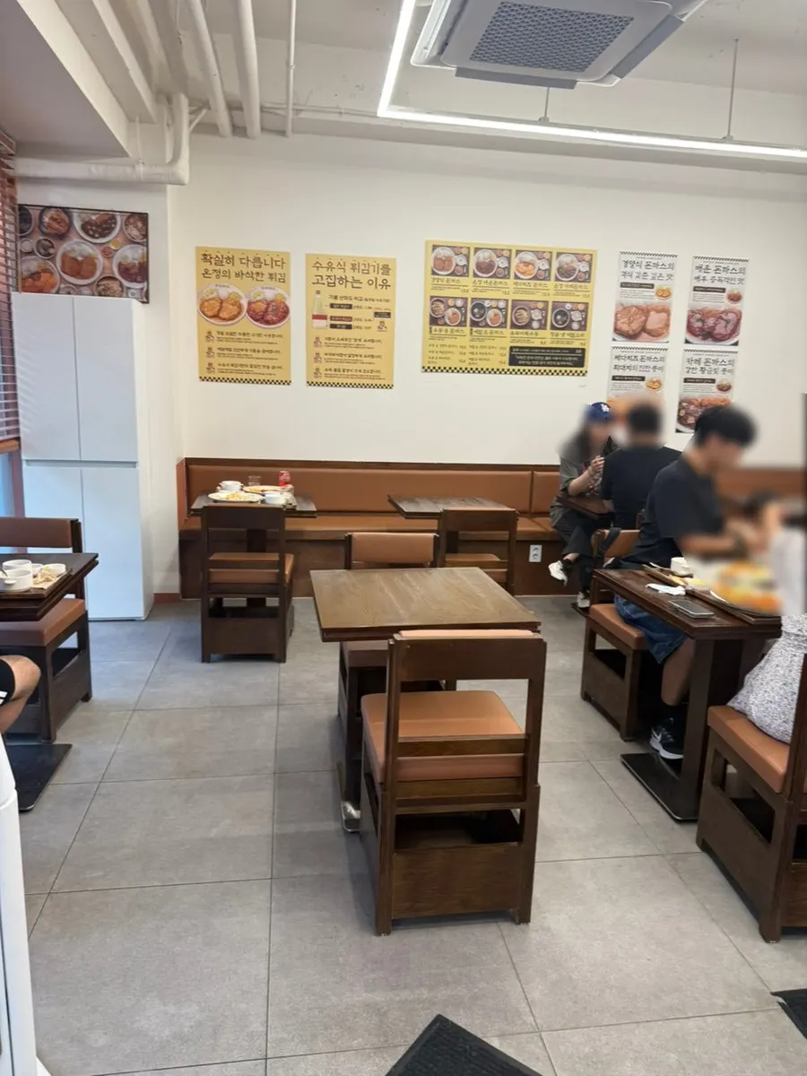 Solo diners and family customers seated in the restaurant