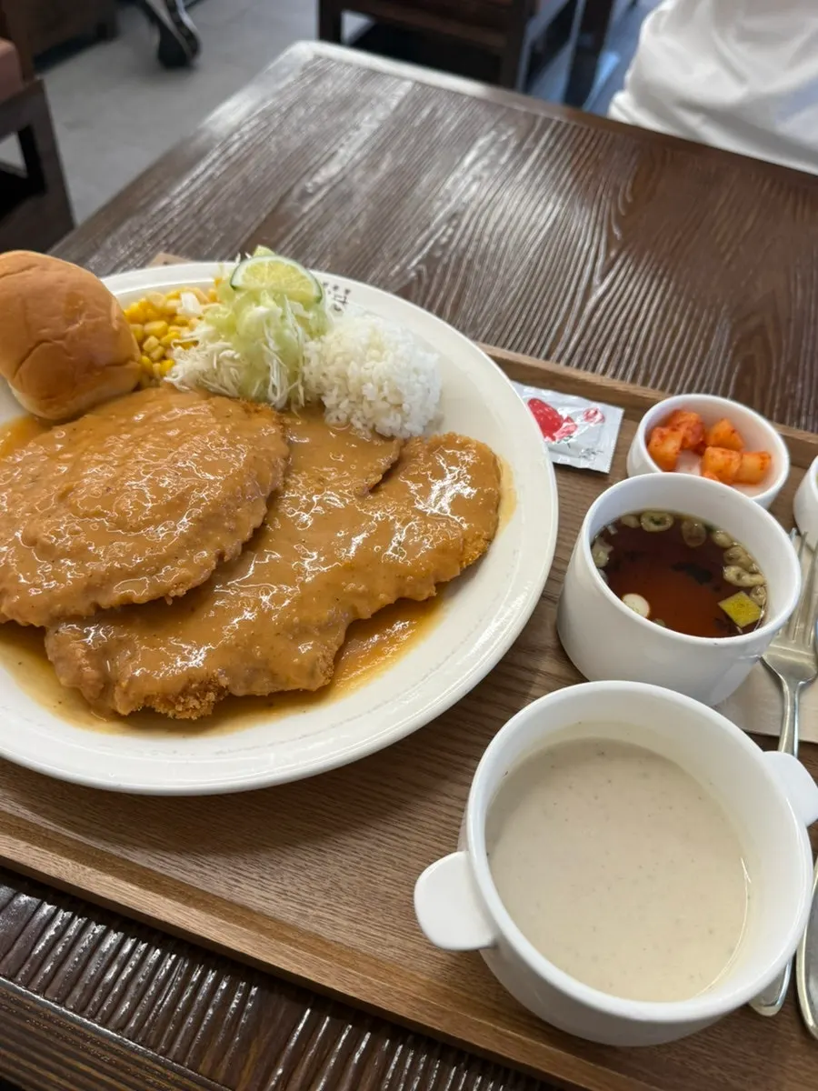 Cross-section of the thin, crispy pork cutlet