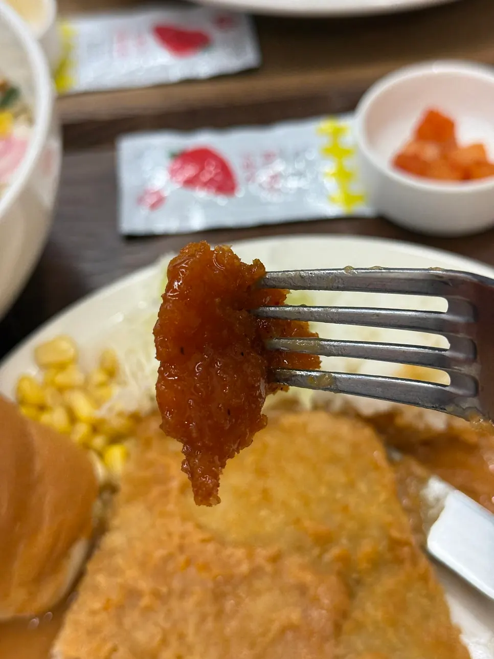 Spicy pork cutlet topped with a generous layer of red sauce