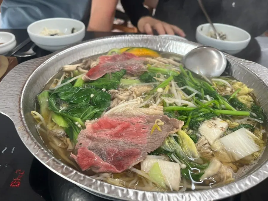 Pot of broth for the handmade rolled dumpling hot pot