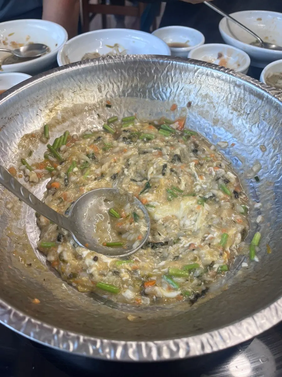 Plate of meat and vegetables scooped out of the pot