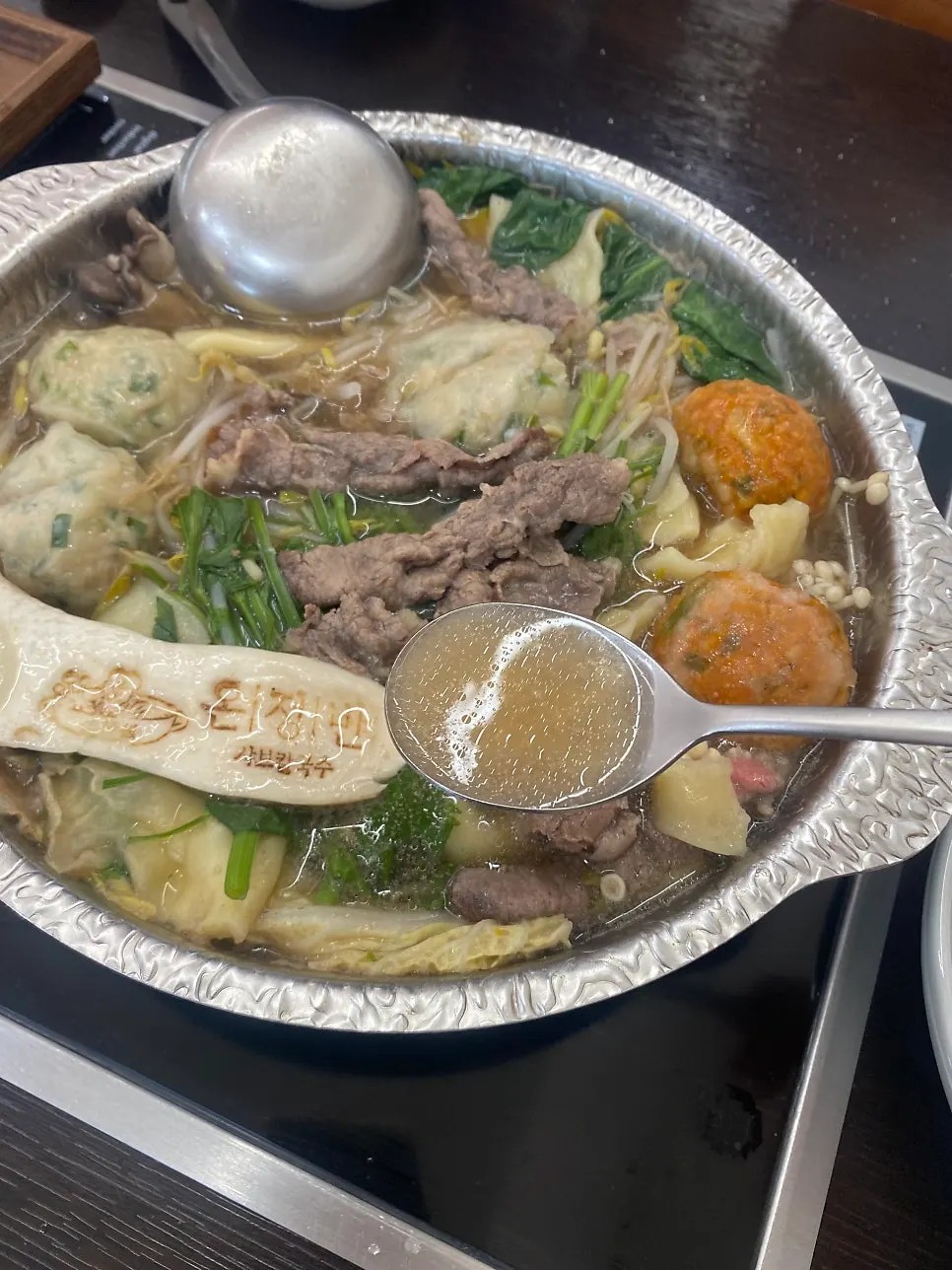 Beef cooked in the hot broth with dipping sauce