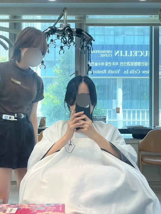 Bangs falling naturally after the cut