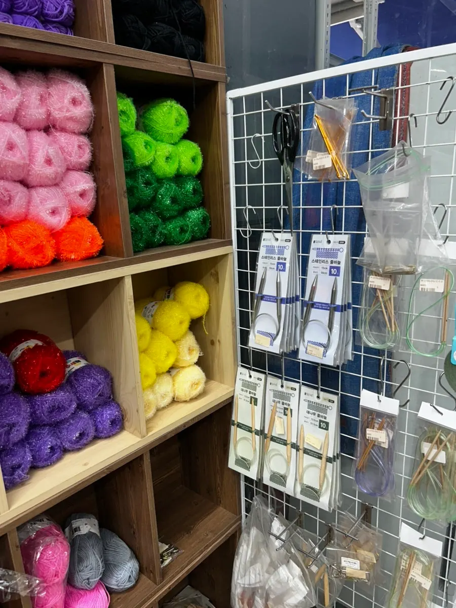 Cosmetics and nail supplies lined up in rows