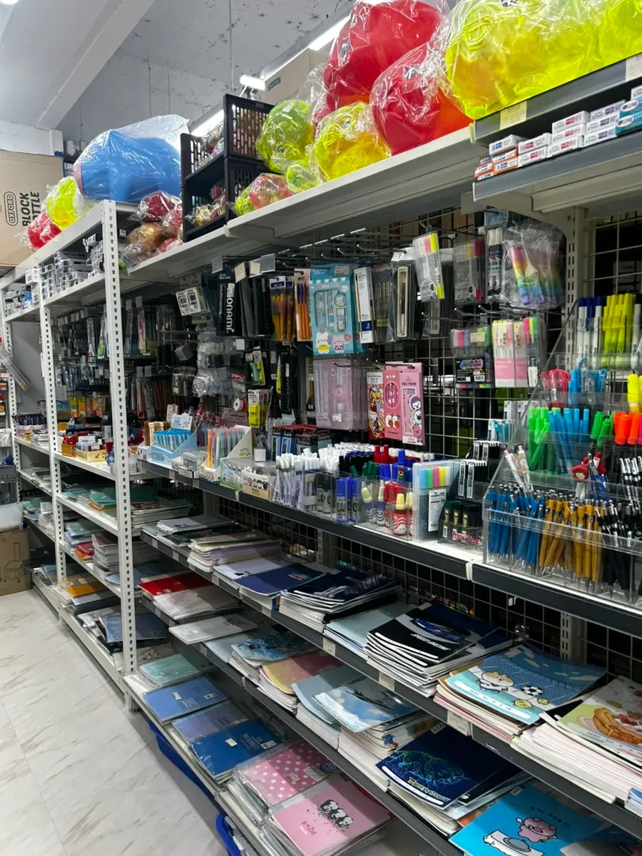 Stationery corner with Crocs Jibbitz charms on display