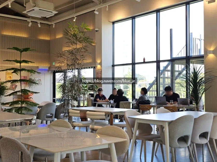 White-and-wood-toned interior seating at On the Rail