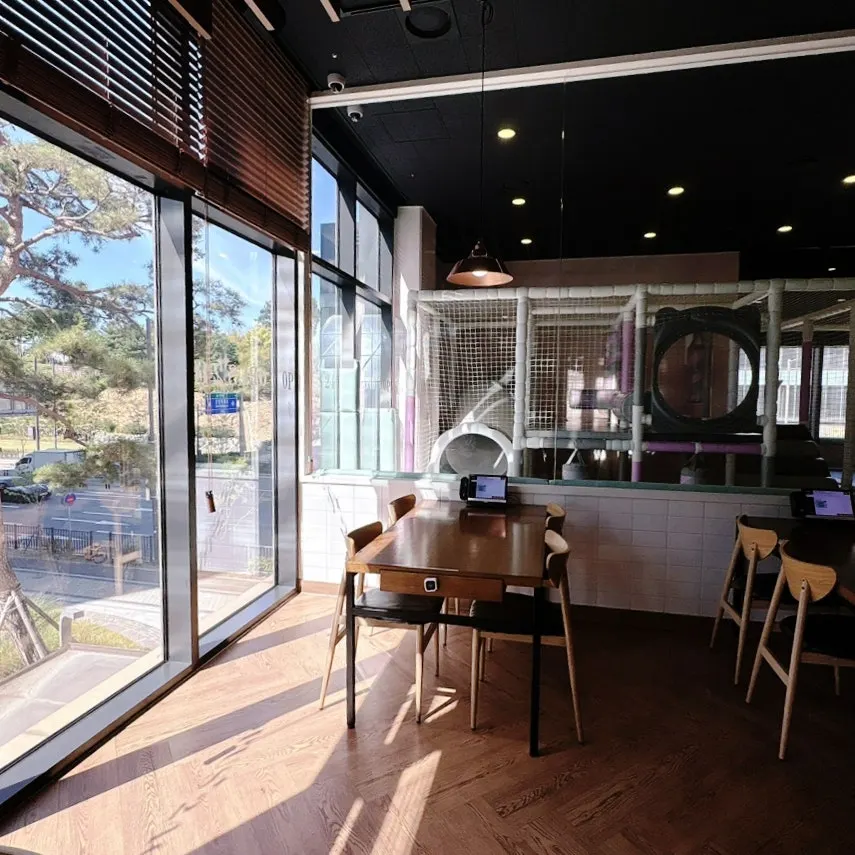 Meal set up at a window seat at Opus240