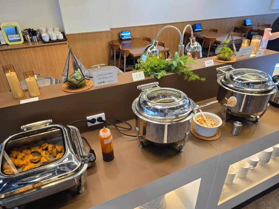 Vegetables and side dishes laid out at the salad bar