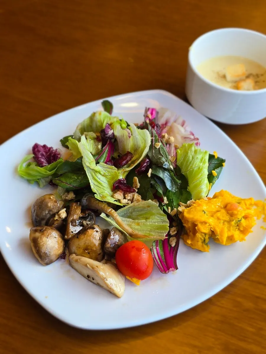 Table set with salad and soup