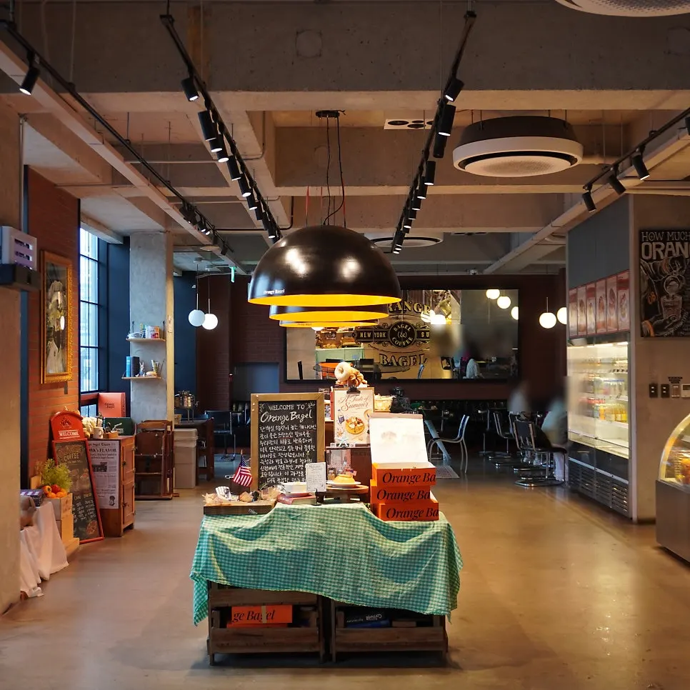 A shot of Orange Bagel's orange-toned interior