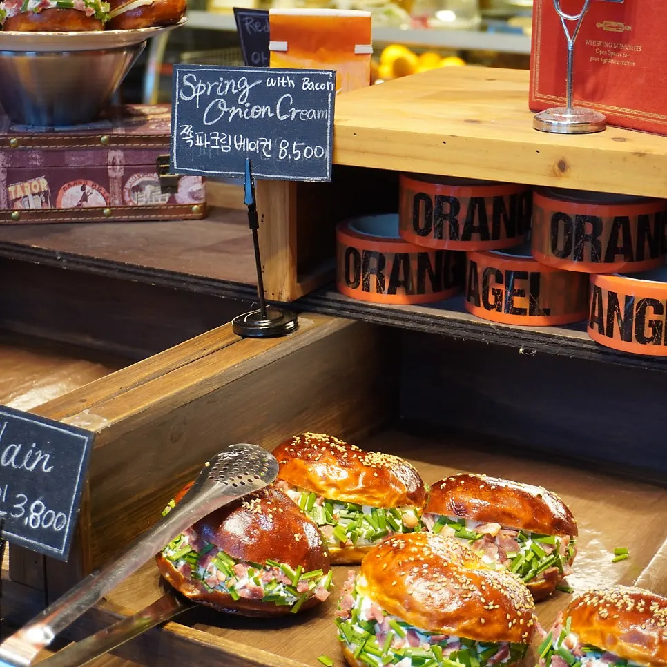 Sand bagels laid out on the display case