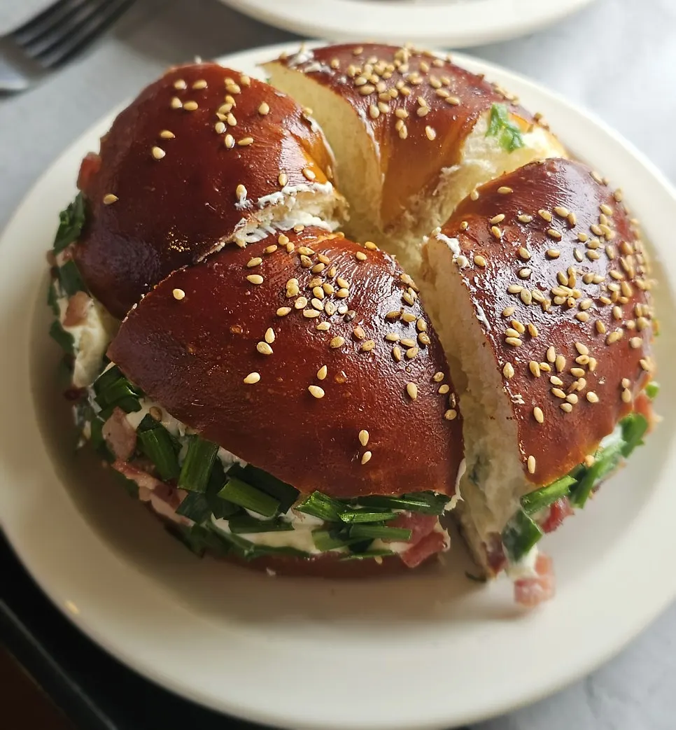 Cross-section of the scallion cream bacon bagel