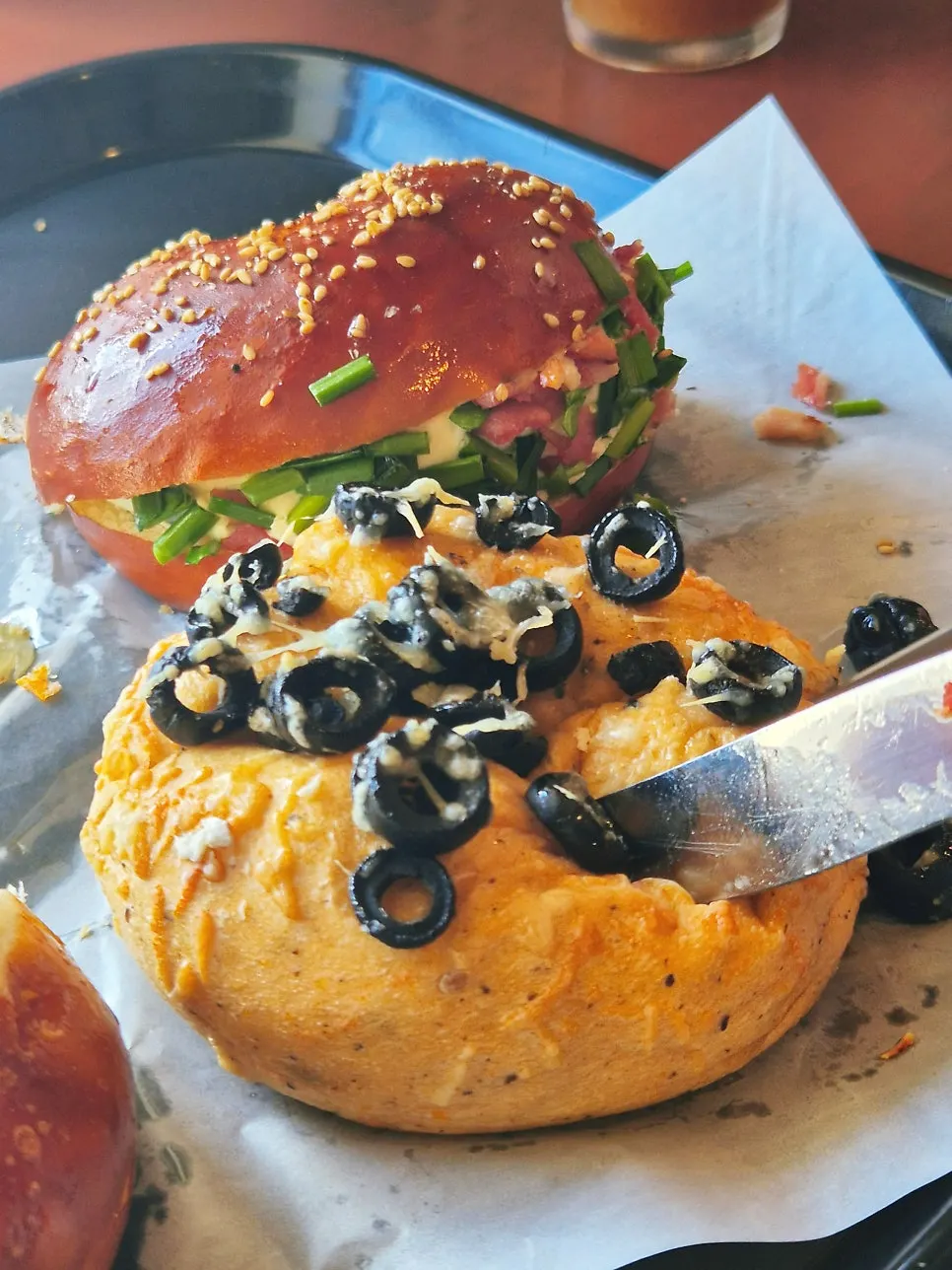 Cross-section of laugen butter bagel with a thick slab of butter inside