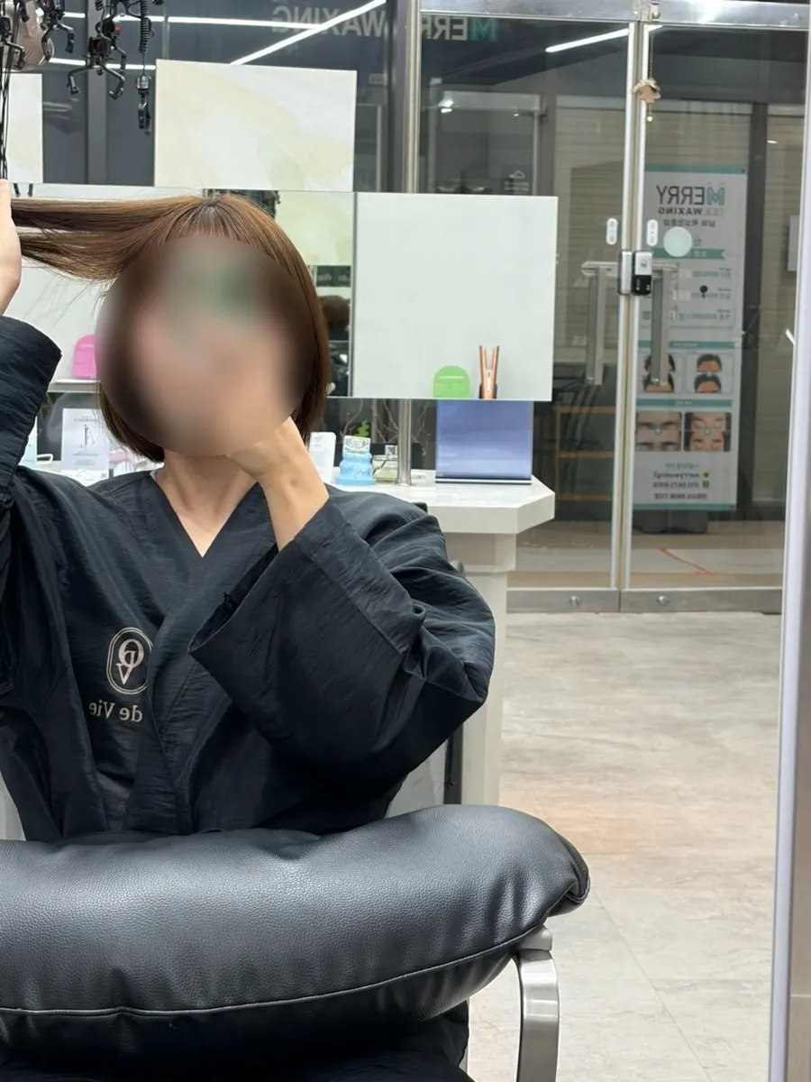 Hair condition before tone-down, showing lightened color