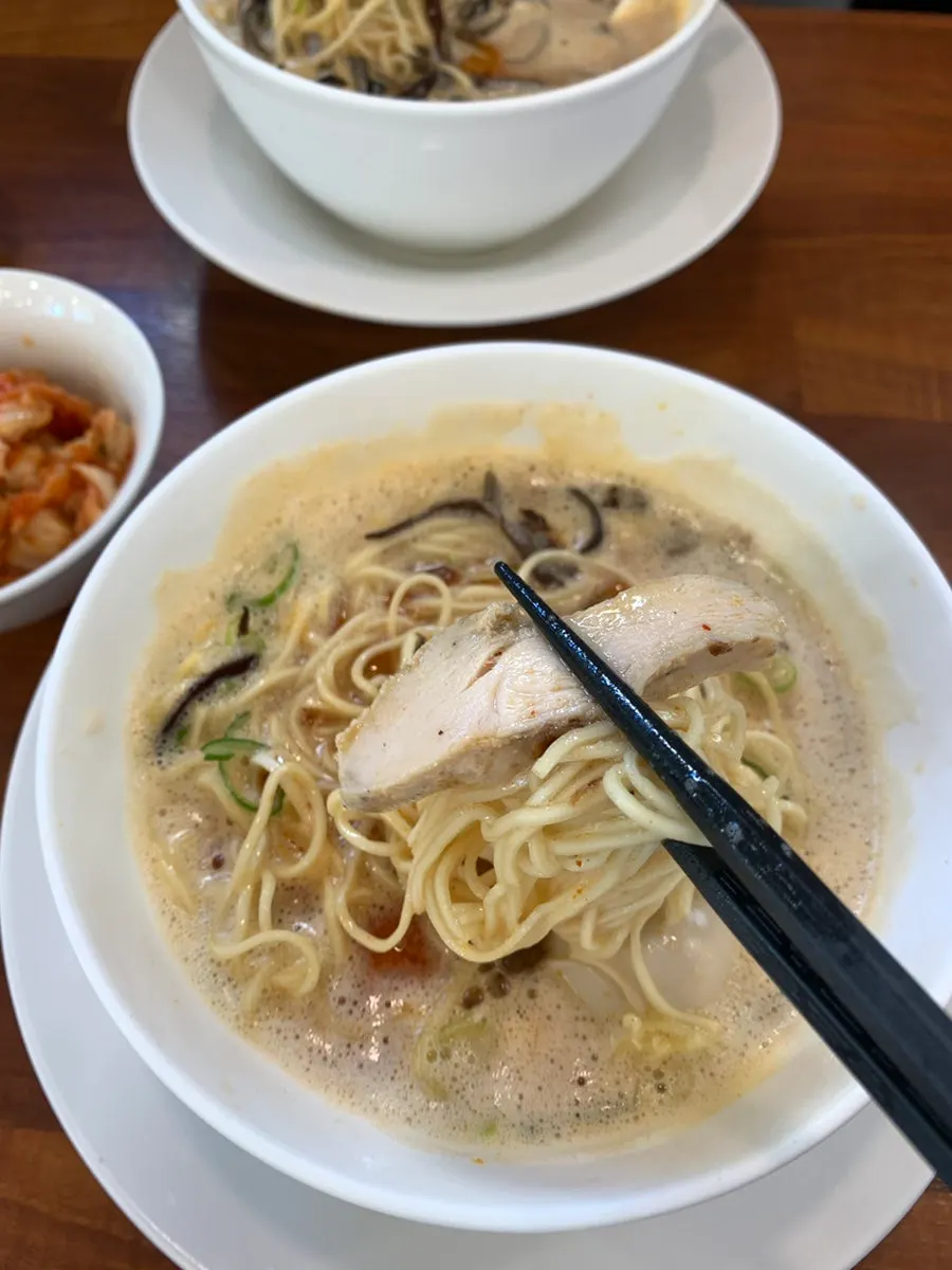 Free rice refill stirred into the rich broth