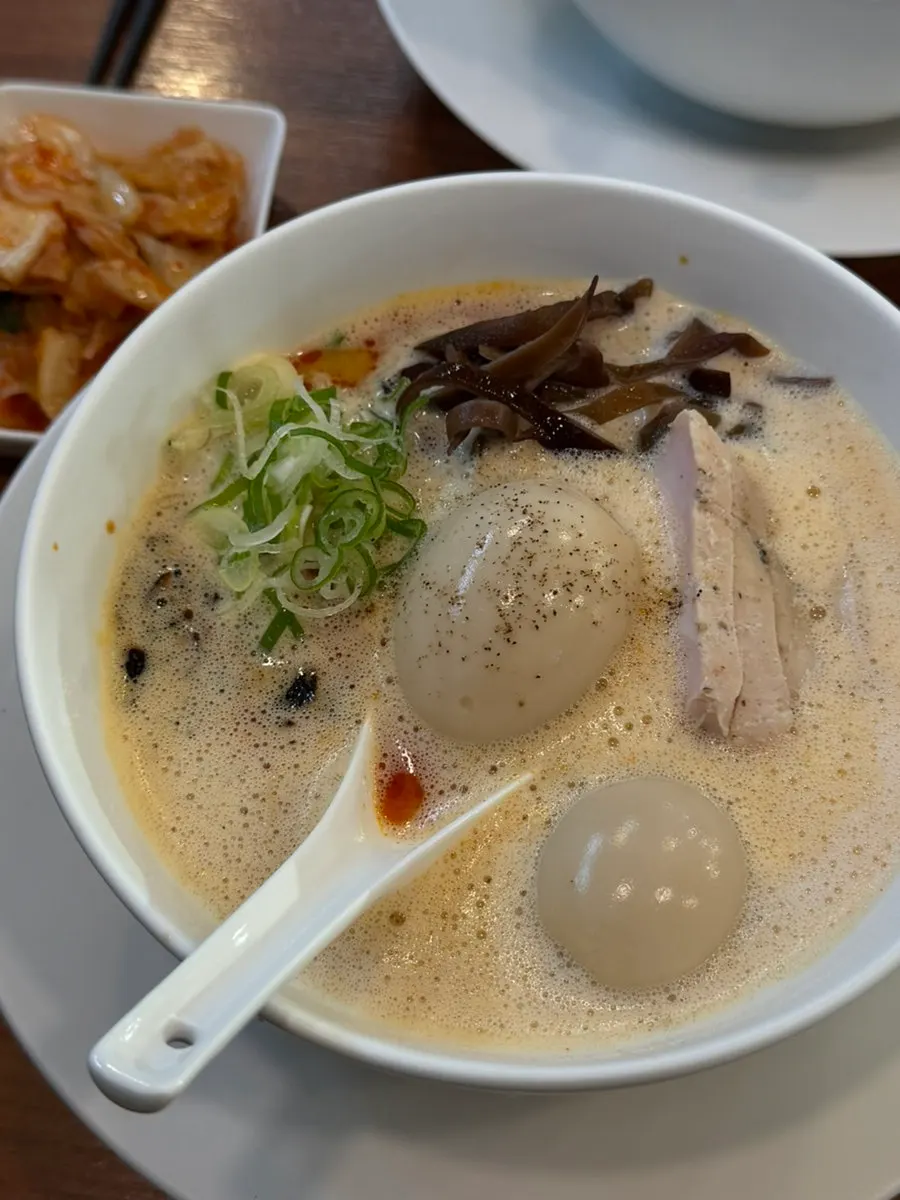 Karaipaitan ramen with added egg and tsukune chashu