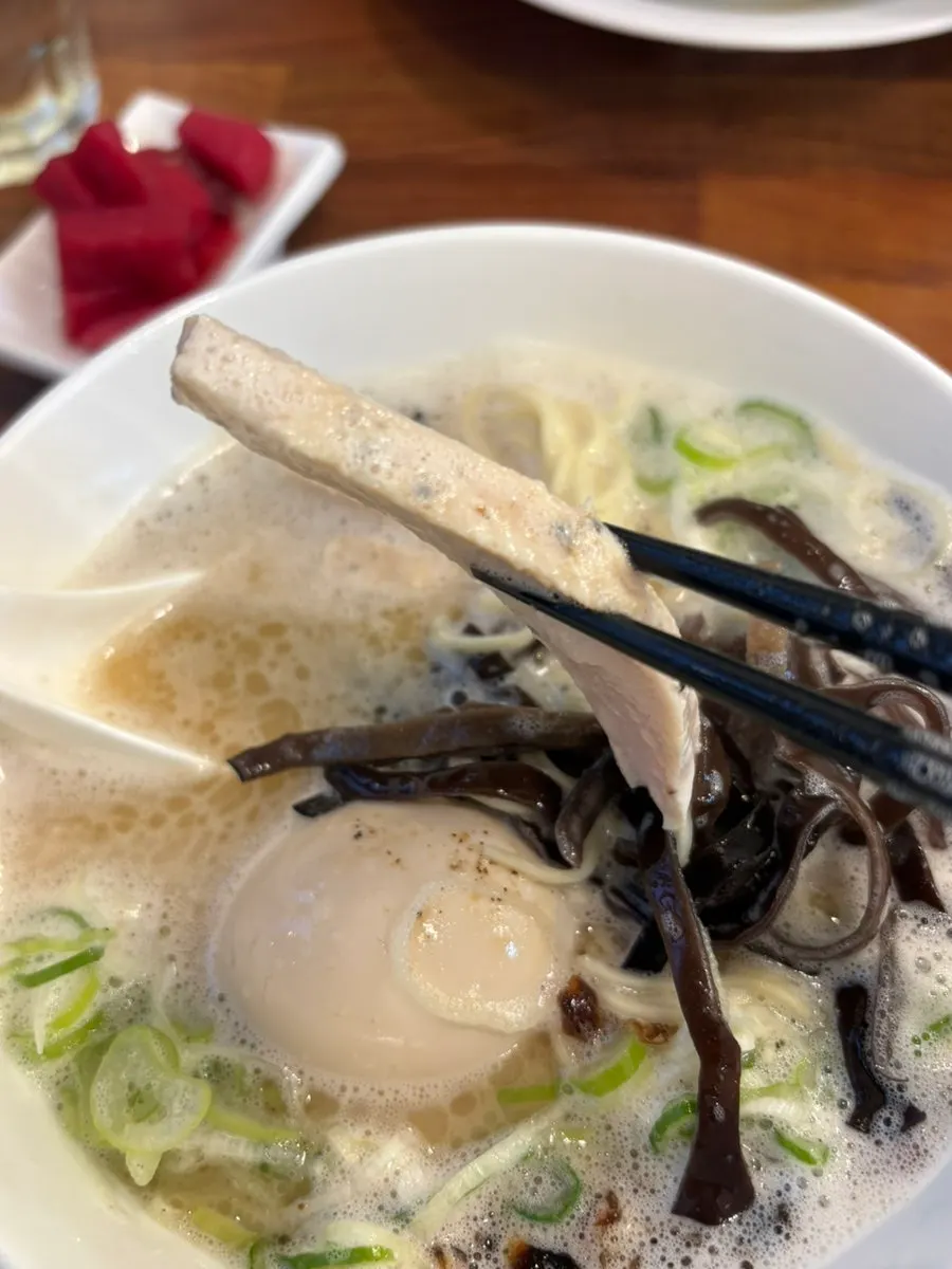 Tori paitan toppings of wood ear mushroom and scallion