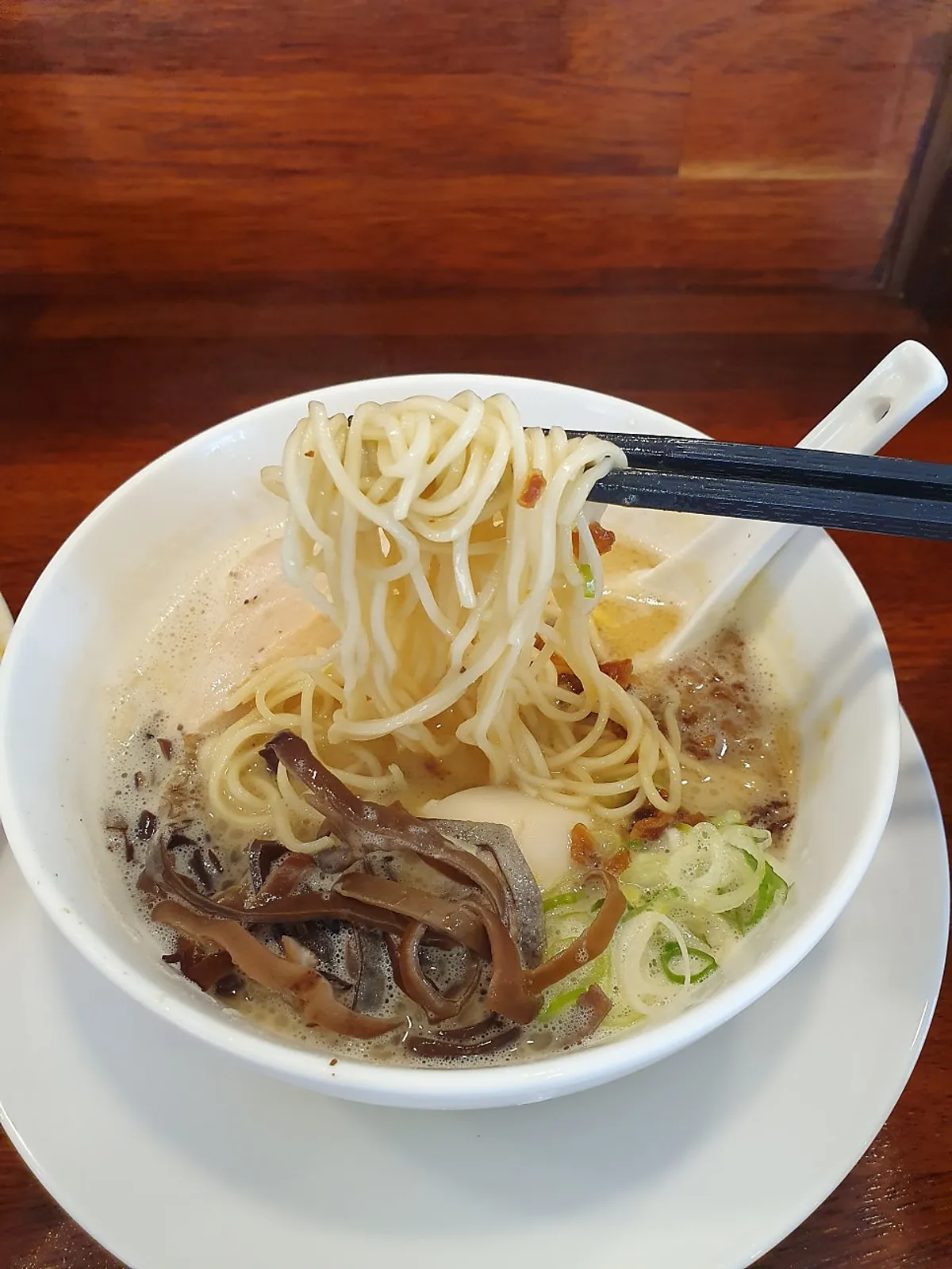 Close-up of the clear tori paitan chicken broth