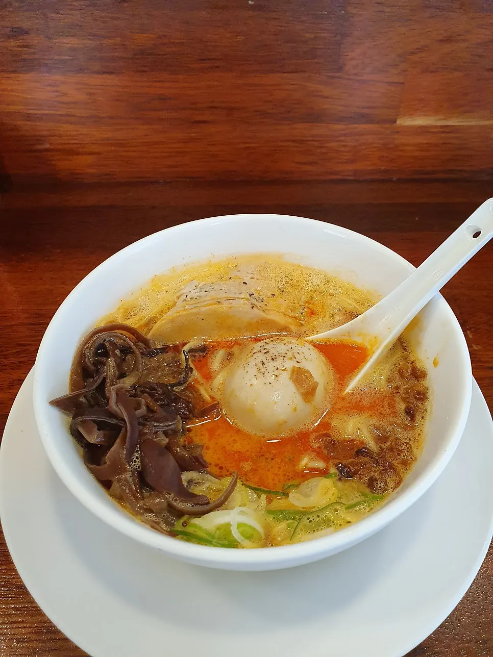 Ramen topped with scallion and burdock root