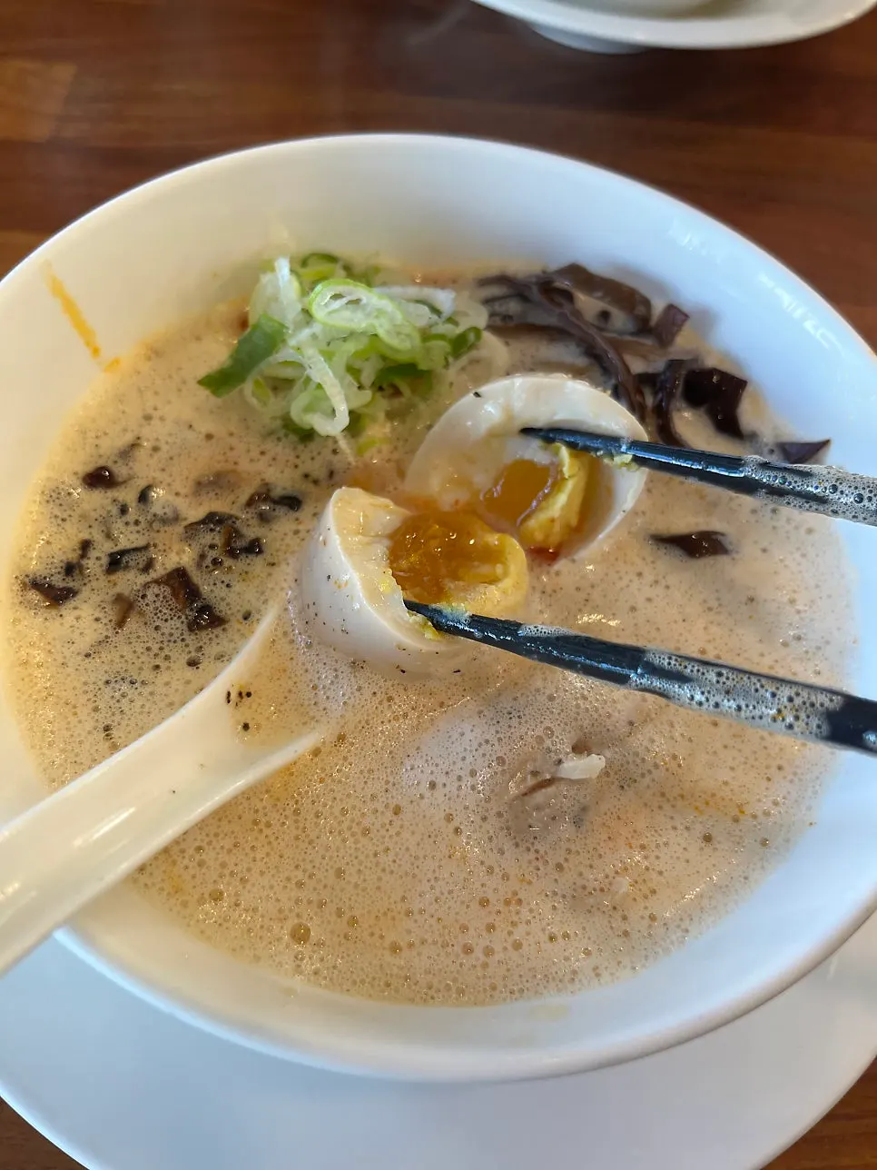 Finishing a ramen meal with a view of Bulgwangcheon