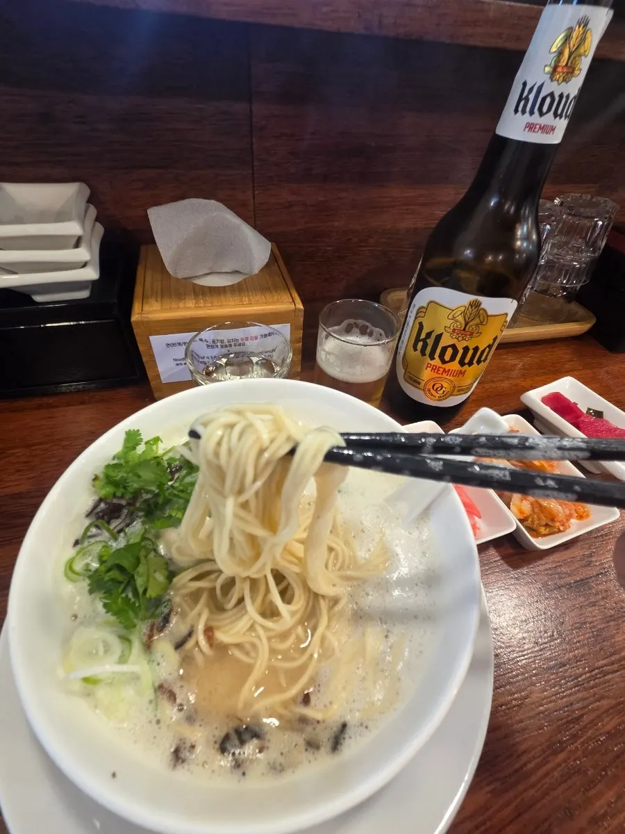 Tori paitan broth and noodles topped with cilantro