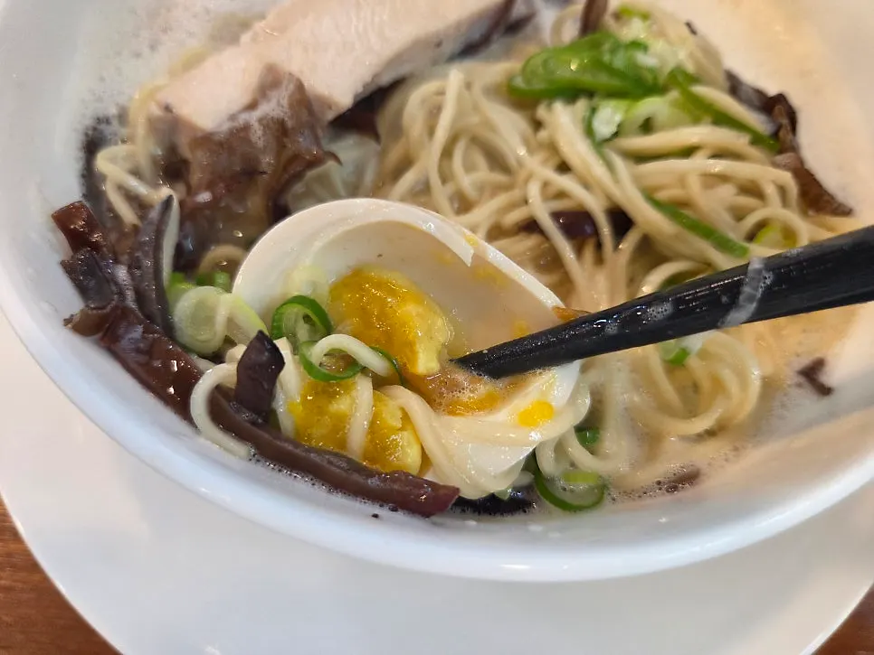 Cross-section of the soft-boiled egg with runny yolk