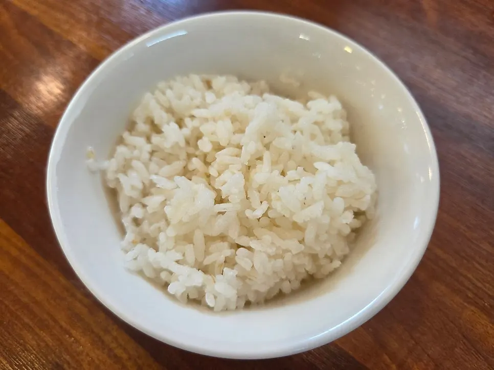 A free bowl of white rice added on