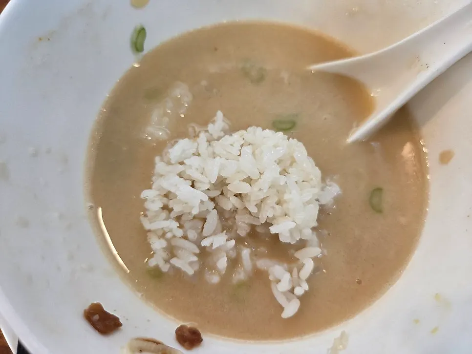 Adding rice into the leftover ramen broth