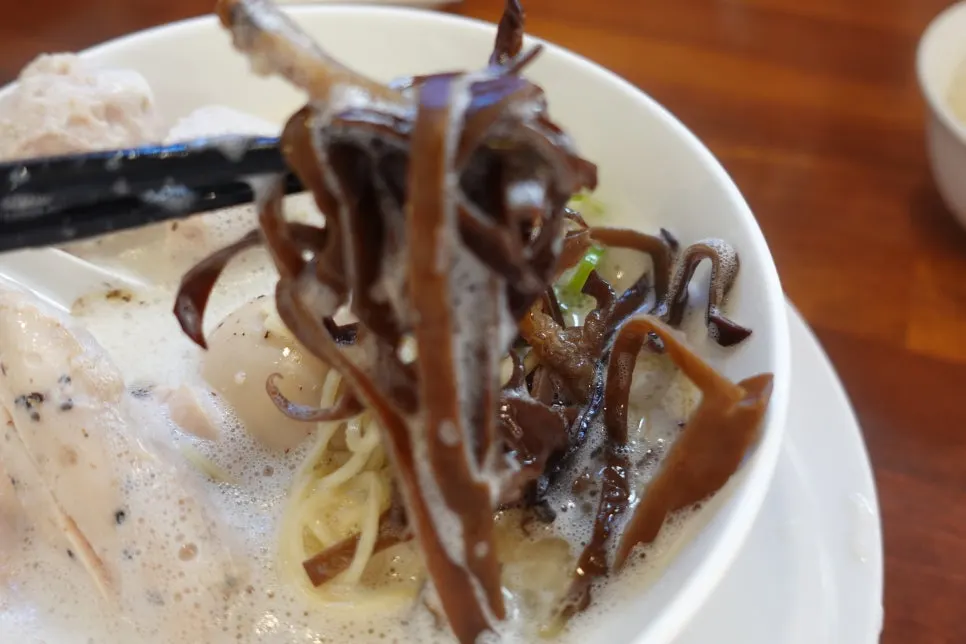 Tsukune chashu pulling apart with chopsticks