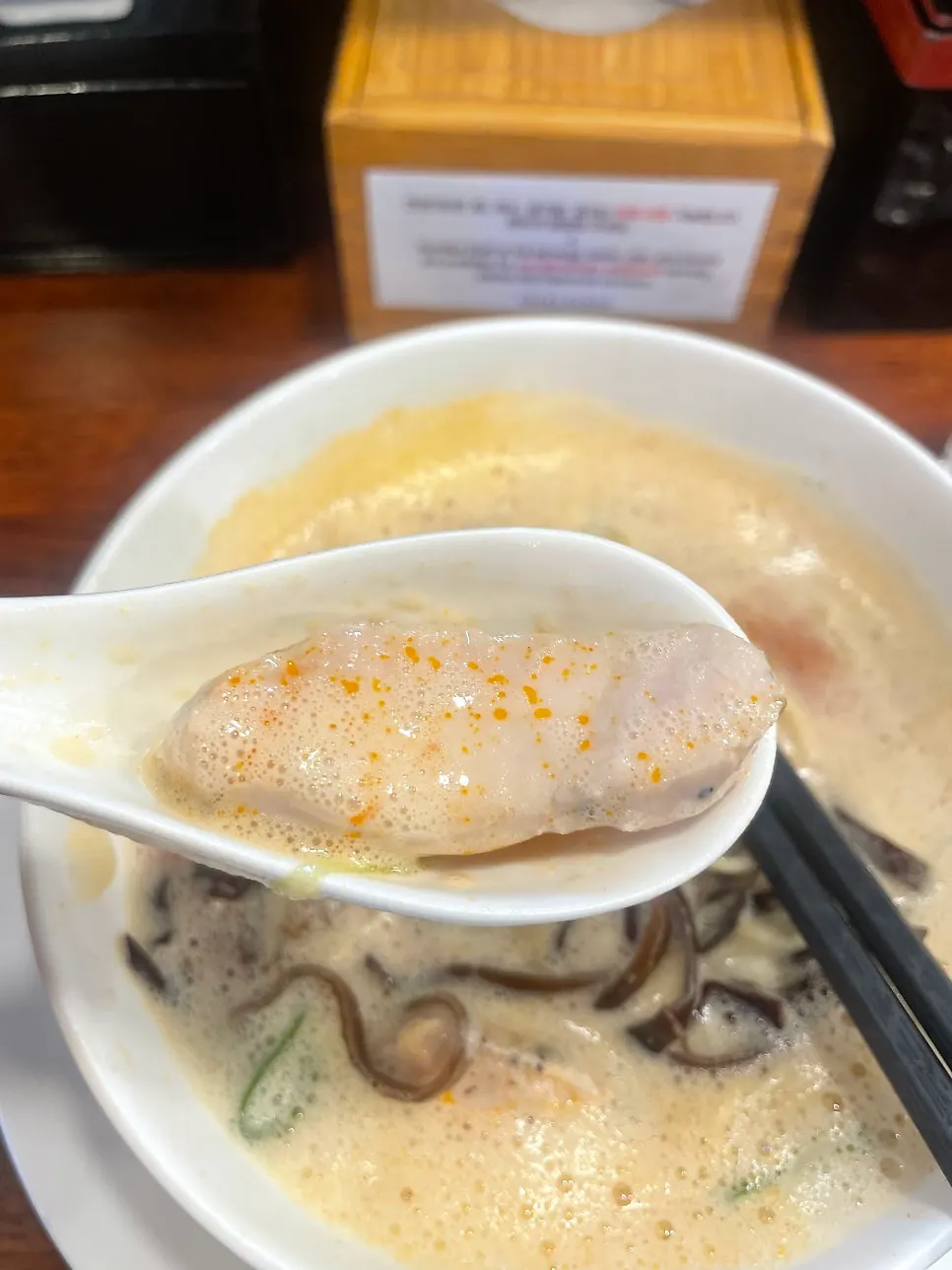 Ramen bowl with a soft-boiled egg and runny yolk