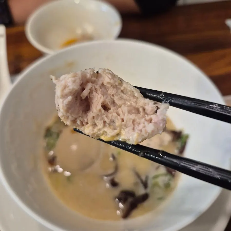 Cross-section of the tsukune with sauce