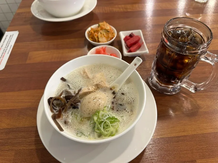 Table with side dishes while waiting for ramen